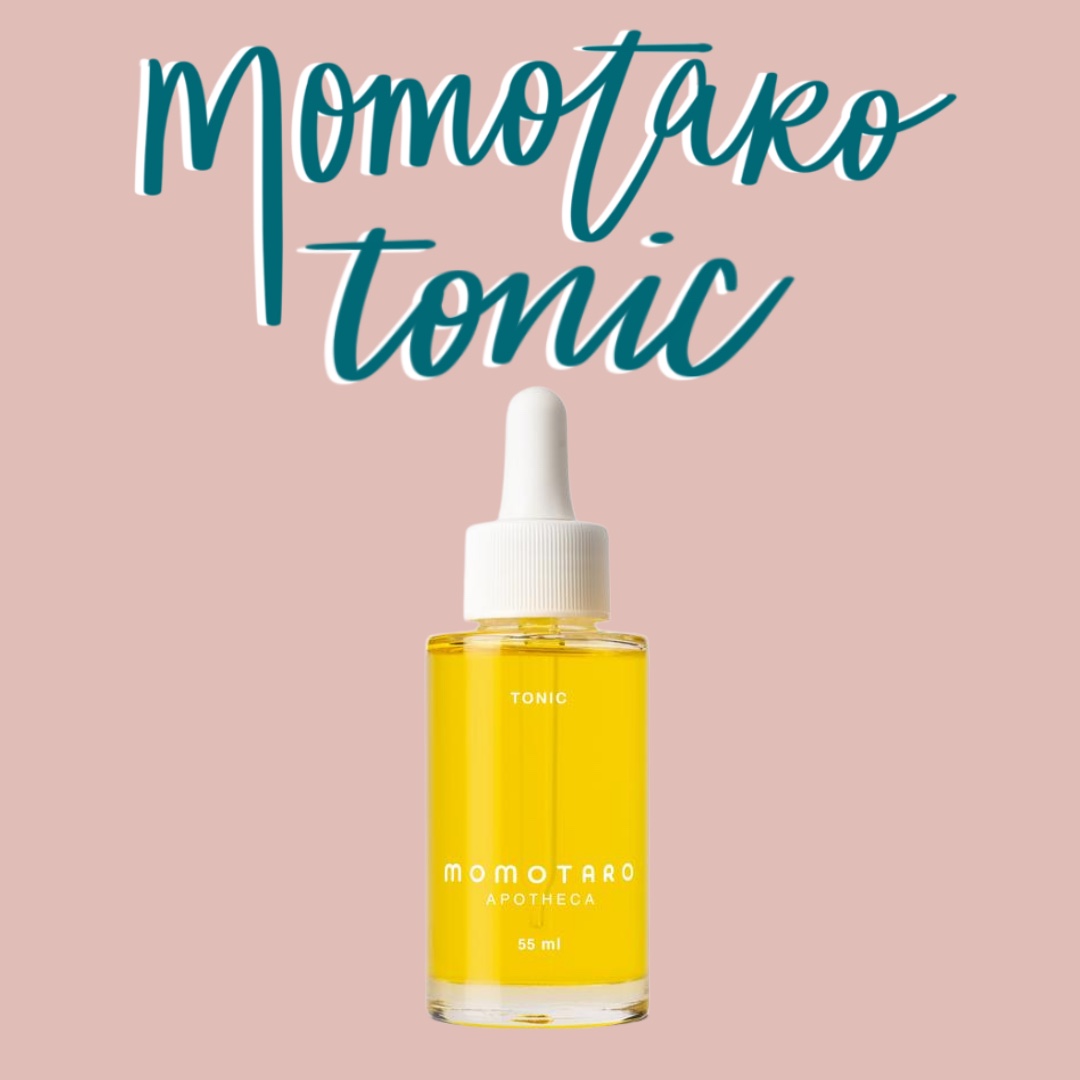 the phrase momotaro tonic drawn in teal against a pink background with momotaro's tonic pictured underneath